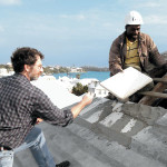 Laying limestone slates for Bermuda rain catching rooftop