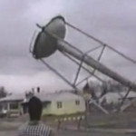 water tower crushes house